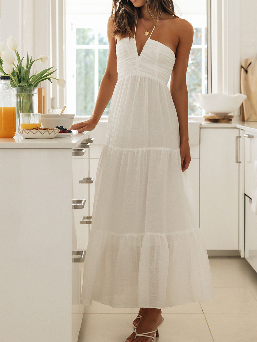 Elegant Sleeveless Maxi Dress with Halter Neckline and Backless Design Perfect for Summer Beach Parties and Casual Events